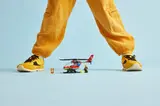 Helicopter set with child's legs.