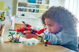 Child playing with plane and fire scene.