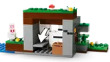 Minecraft shelter with secret sliding wall.