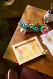 LEGO floral frame and base separated.