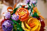 Close-up of orange and yellow LEGO flowers.