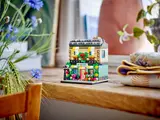 LEGO Flower Store on wooden shelf, lifestyle shot.