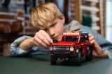 Child playing with Bronco lights.