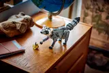 LEGO raccoon on dresser.