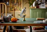 LEGO falcon on table.