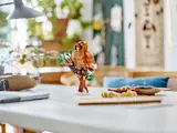 LEGO owl on tree, table display.