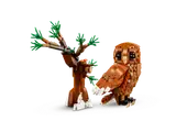 LEGO owl and tree trunk.