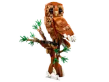 LEGO owl perched on a tree.