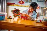 Girl playing with open set.