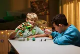 Boys playing with the mech.