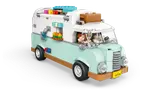 Camper van closed, minifigures in driver's seat.