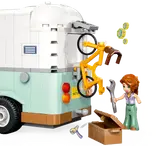 Camper rear with bike rack and tools.