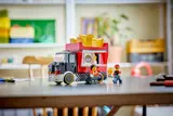 Child playing with minifigures.