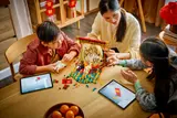 Family building LEGO together