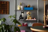 LEGO puppy and cat on shelf.