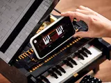 Placing smartphone on Grand Piano music stand.