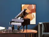 LEGO Grand Piano on table, elegant room.