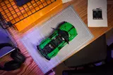 Top view of green LEGO Technic Bugatti Chiron on a cutting mat.