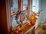LEGO Halloween Wreath displayed on a cabinet.