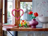 LEGO heart ornament in a decorative scene.