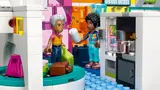 Minifigures at luggage claim and coffee bar.