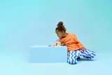 Child playing with Heartlake City Bunny Hotel.