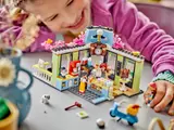 Close-up of child playing with cafe interior.