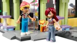 Minifigures Autumn and Liann at cafe entrance.