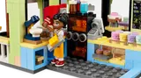 Barista minifigure in cafe kitchen.