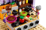 Minifigures cooking on a LEGO stove.