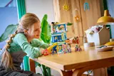 Child playing with Club House.
