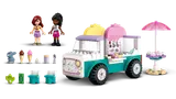 Disassembled LEGO Friends Ice Cream Truck parts.