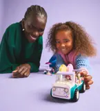 Child playing with LEGO Ice Cream Truck.