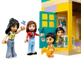 LEGO Friends Liann, Autumn, and children at preschool entrance.