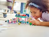 Child playing with LEGO Diner.