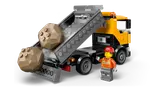 Dump truck unloading rocks