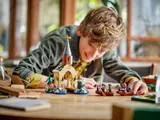 Child playing with Boathouse set.