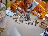 Person folding LEGO Potions Class set.