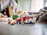 Camper Van and minifigures by campfire.