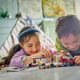 Kids playing with LEGO Camper Van.