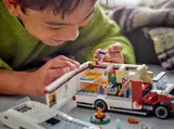 Child playing with Camper Van interior.