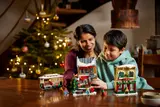 Mother and child building LEGO.