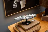 Displayed on bookshelf.