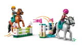 Horses jumping hurdles with minifigure riders.