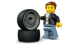 Minifigure with large LEGO tires.