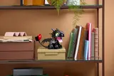 LEGO Toothless on a shelf.