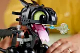 Toothless exhaling plasma, close-up.