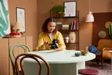 Person holding LEGO Toothless.