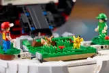 Grassy scene with Pokémon and trainers.