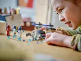 Child playing with LEGO set.
